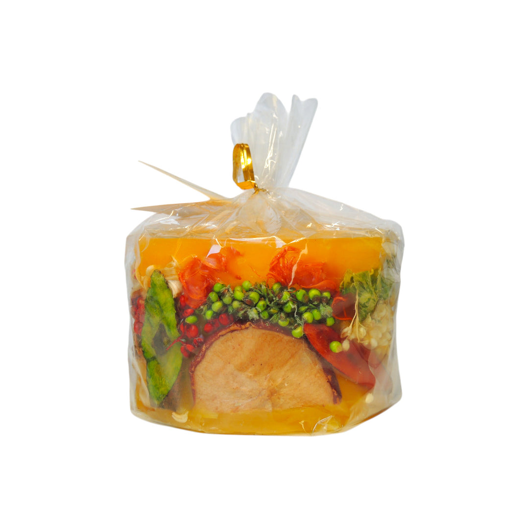 scented candle with real fruits